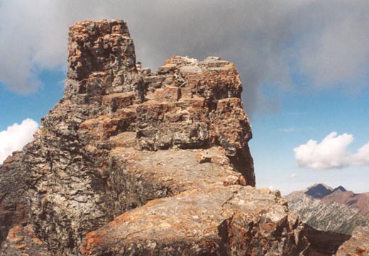 Colorful rocks on descent of lower, west summit