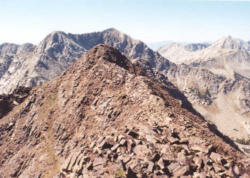 From true summit looking west over false peak to White Baldy, Pfeifferhorn distant